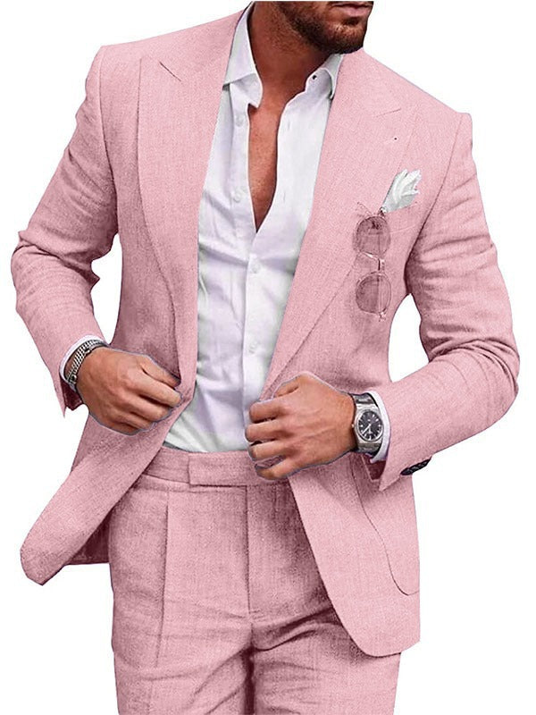 Man wearing a pink suit with a white shirt on a white background