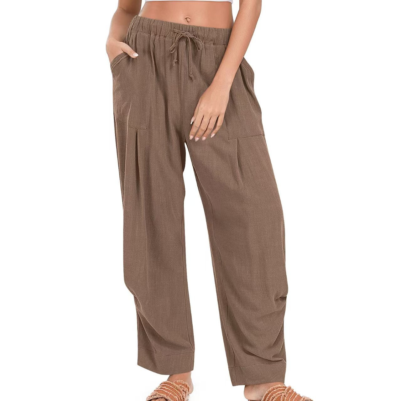 Brown wide-leg pants worn by a person on a white background