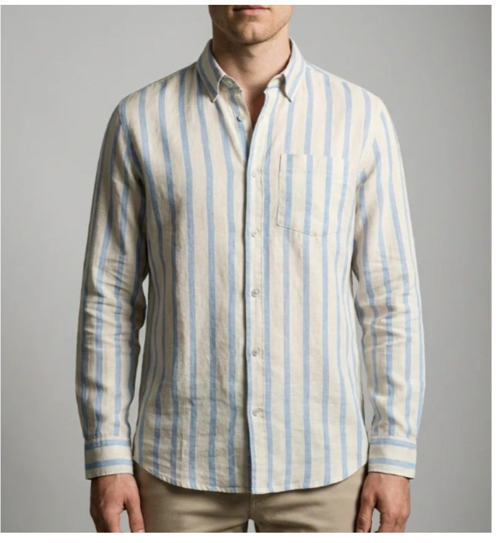 Man wearing a striped shirt with blue and beige colors on a gray background