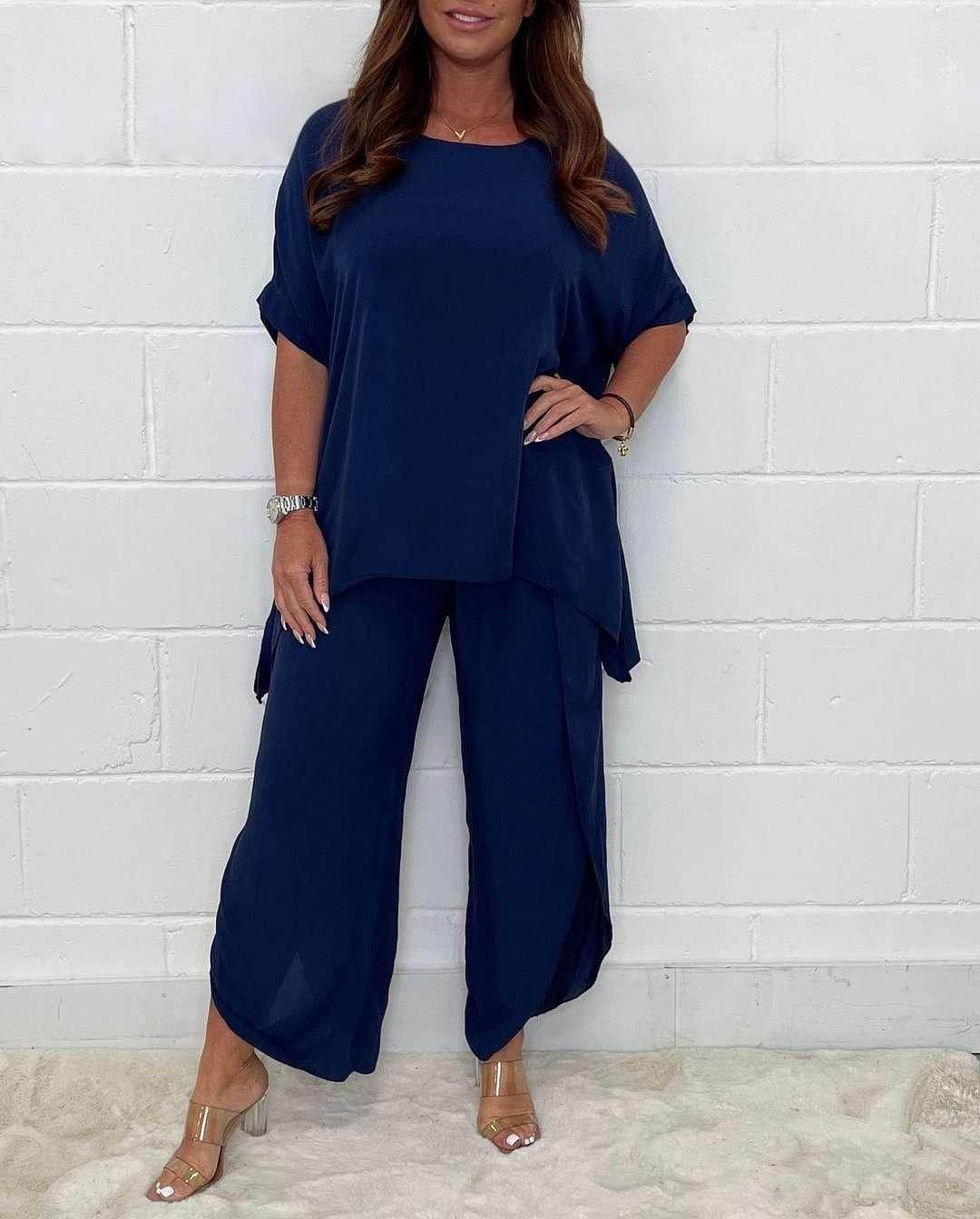 Woman wearing navy blue loose fit top and wide leg pants set from ZA-Zola, stylish apparel UK