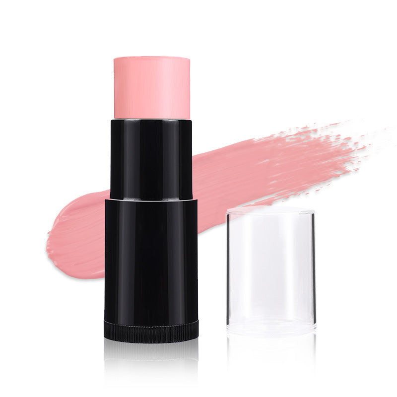 Pink makeup stick with black casing on a white background