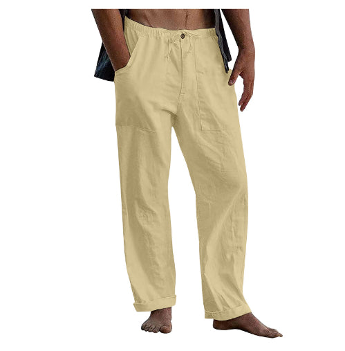 Beige pants worn by a person on a white background