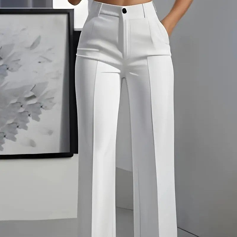 White pants worn by a person with a neutral background