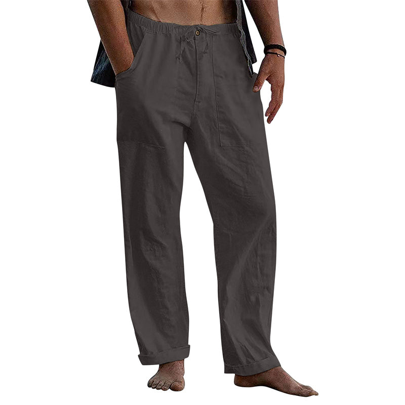 Person wearing gray pants on a white background