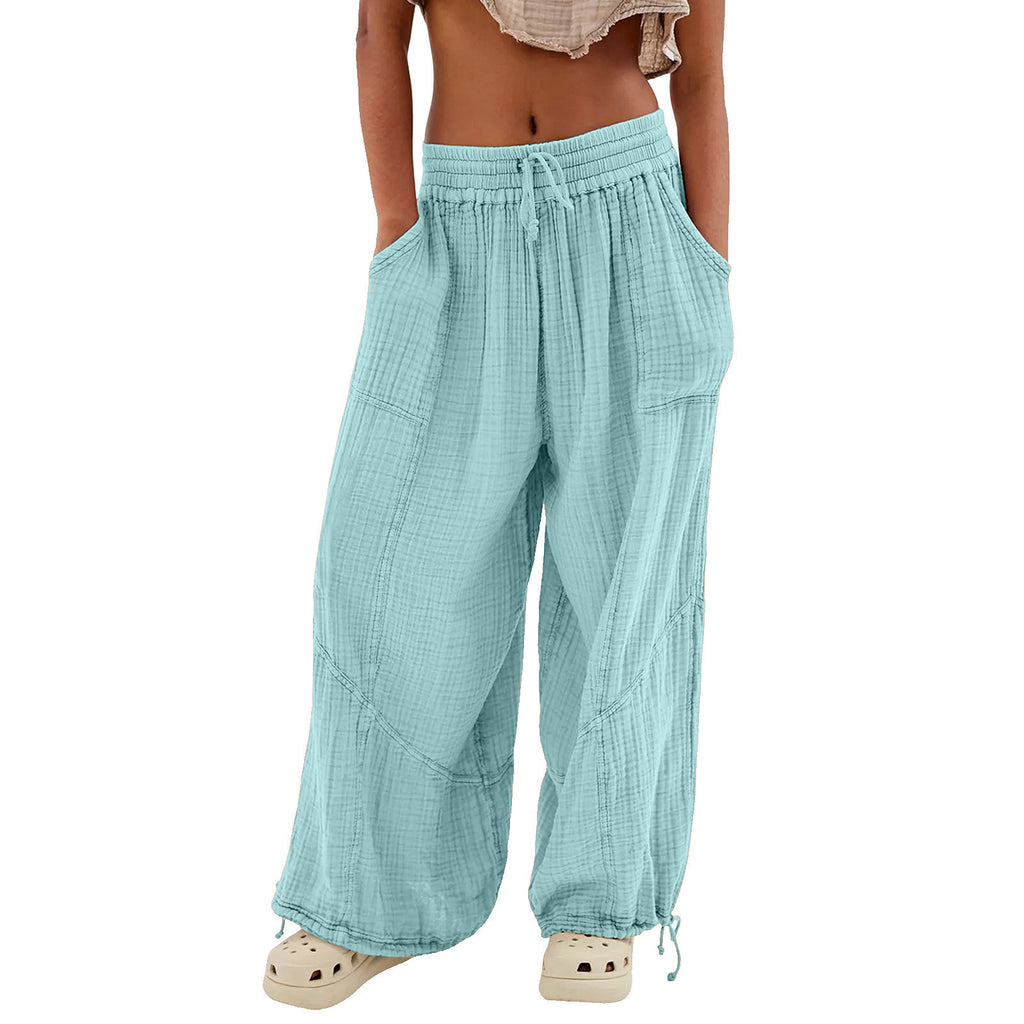 Light blue checkered pants worn by a person on a white background
