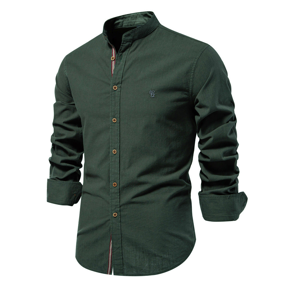 Green shirt with rolled-up sleeves on a white background