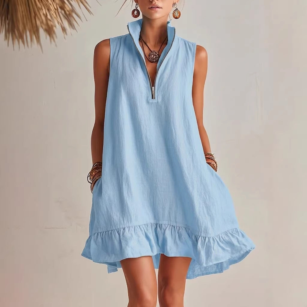 Light blue dress worn by a model against a neutral background