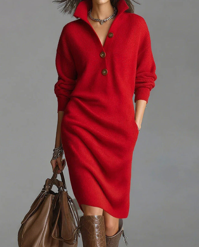 Red sweater dress worn by a person with a brown handbag on a gray background