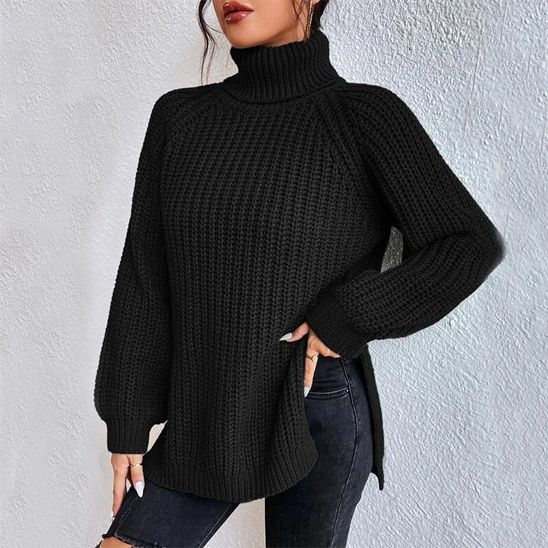 Person wearing a black turtleneck sweater against a white background