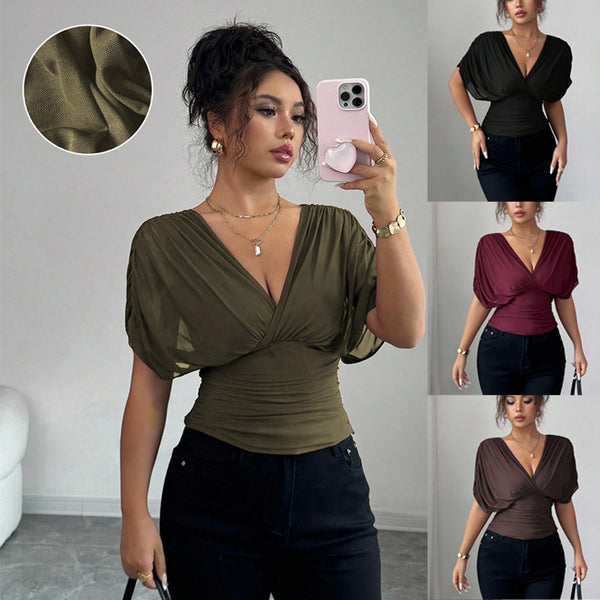 Woman taking a mirror selfie wearing a green top with puff sleeves, surrounded by images of the top in different colors.