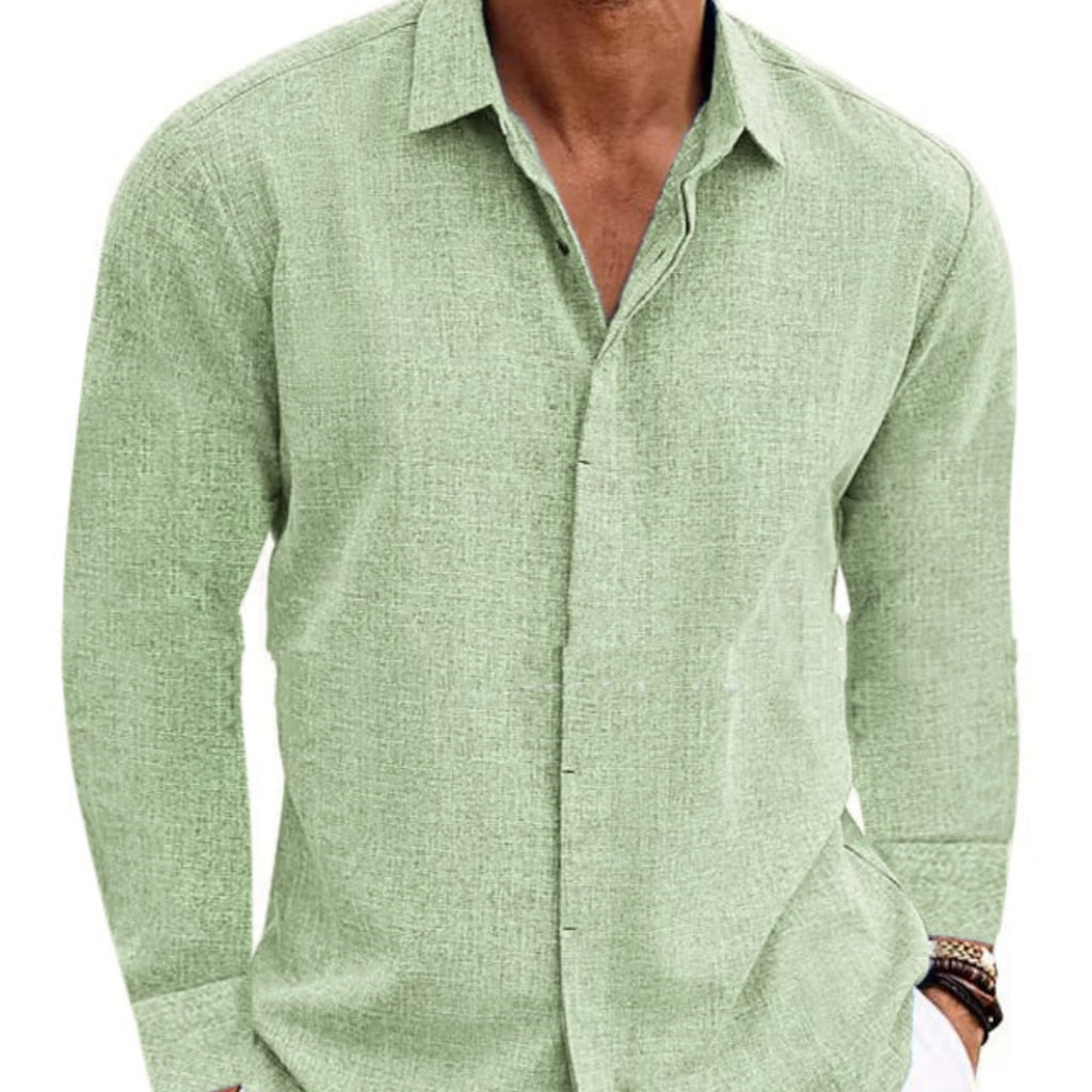Green button-up shirt worn by a person on a white background