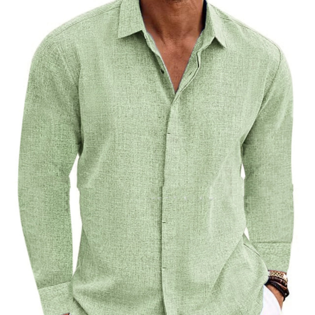 Green button-up shirt worn by a person on a white background
