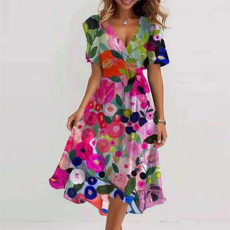 Woman wearing a colorful floral dress on a white background