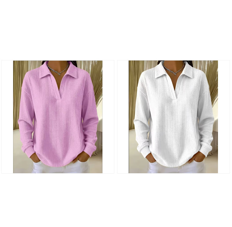 Two women modeling the same long-sleeve collared waffle-knit top in different colors, shown side by side on a white background. The left model wears a light pink version, and the right model wears a white version.