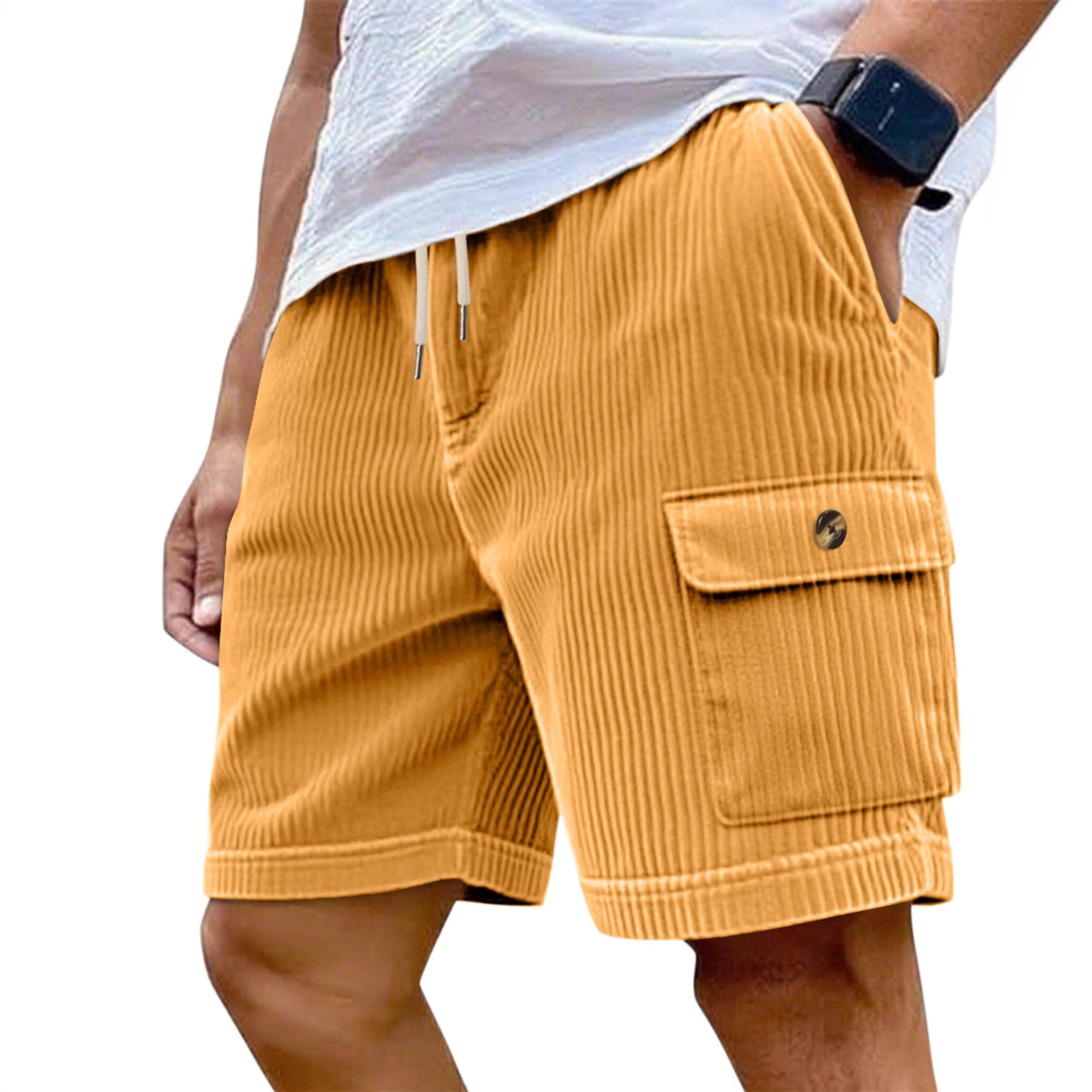 Mustard yellow corduroy shorts worn by a person on a white background