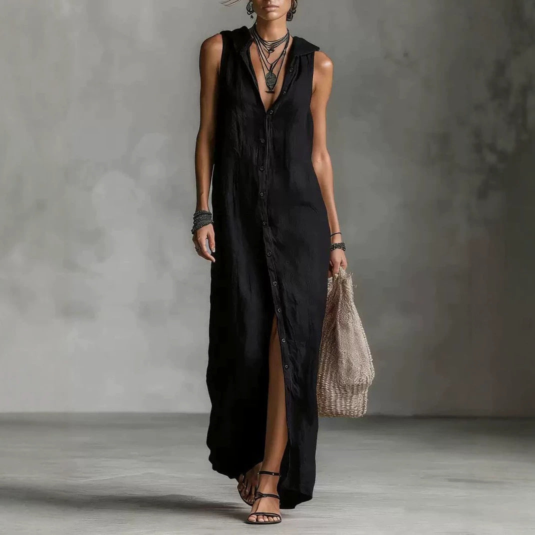 Woman wearing a black sleeveless dress with a textured background