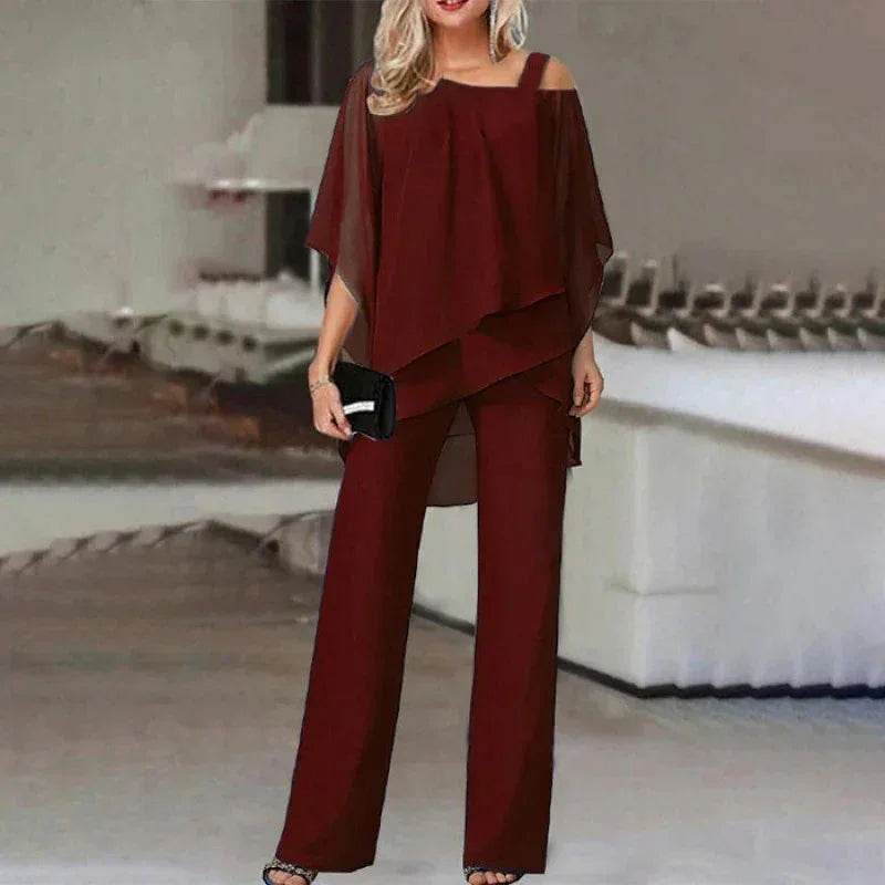 Woman wearing elegant burgundy pantsuit with sheer overlay, ZA-Zola trendy fashion style