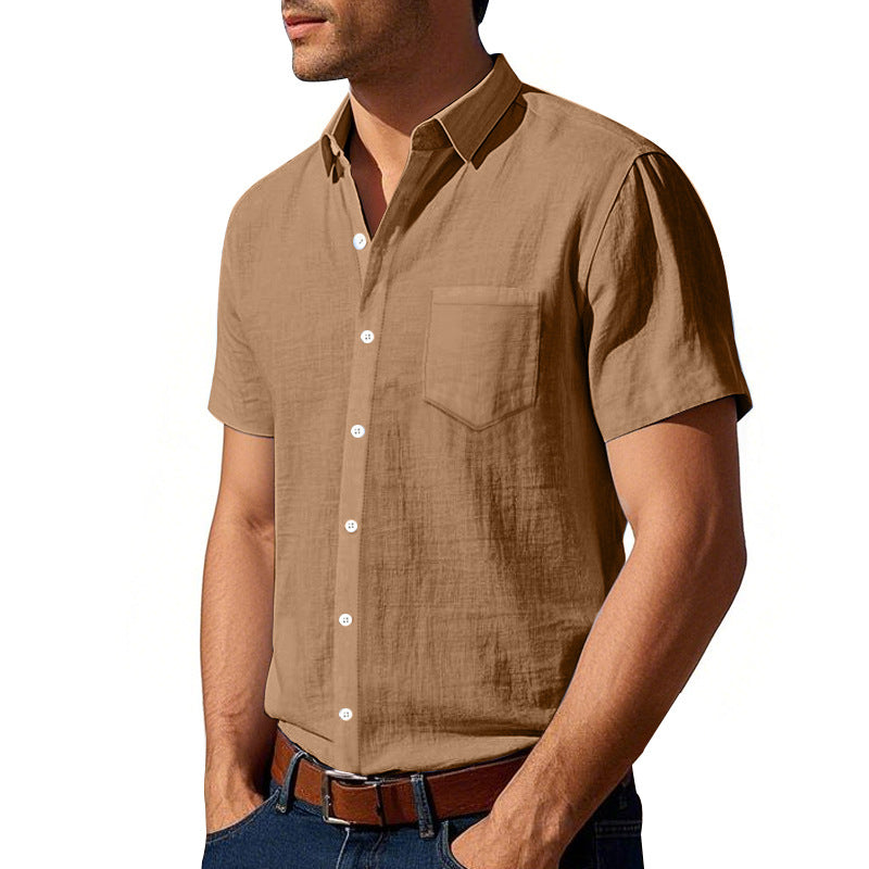Man wearing a brown short-sleeve button-up shirt on a white background