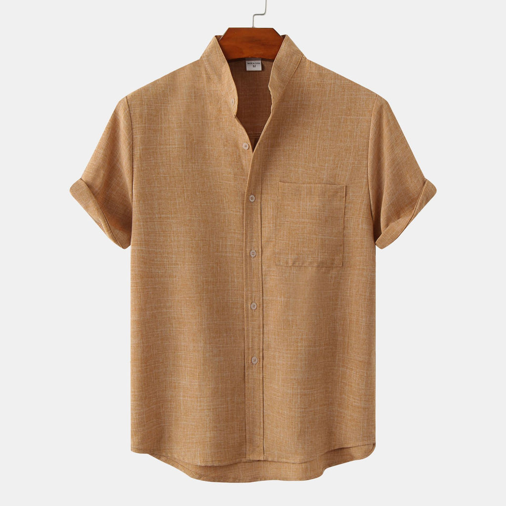 Brown short-sleeve shirt on a hanger against a white background