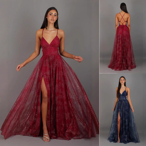 Red evening gown with a slit on a gray background