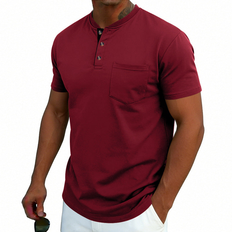 Man wearing a maroon short-sleeve shirt with a pocket on a white background