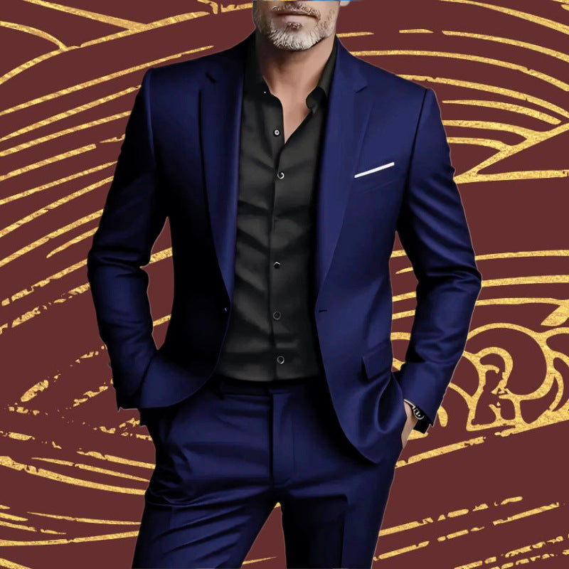 Man wearing a blue suit with a black shirt against a decorative brown and gold background