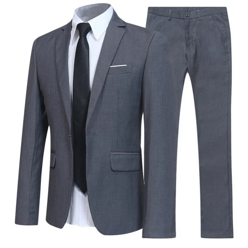 Gray suit jacket, white shirt, black tie, and gray pants on a white background