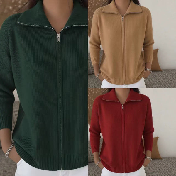 Three different colored zip-up sweaters worn by a person.