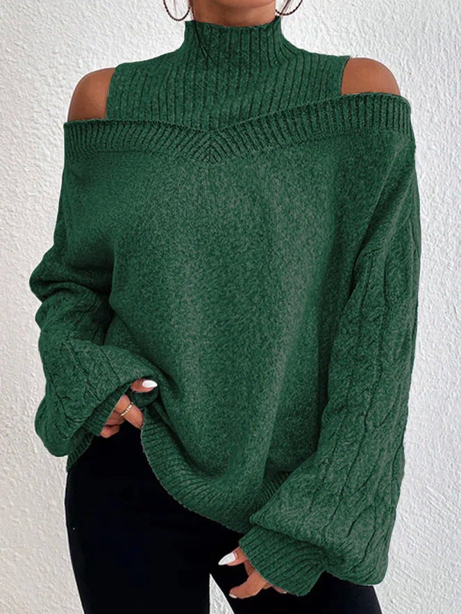 Green sweater with cut-out shoulders on a white background