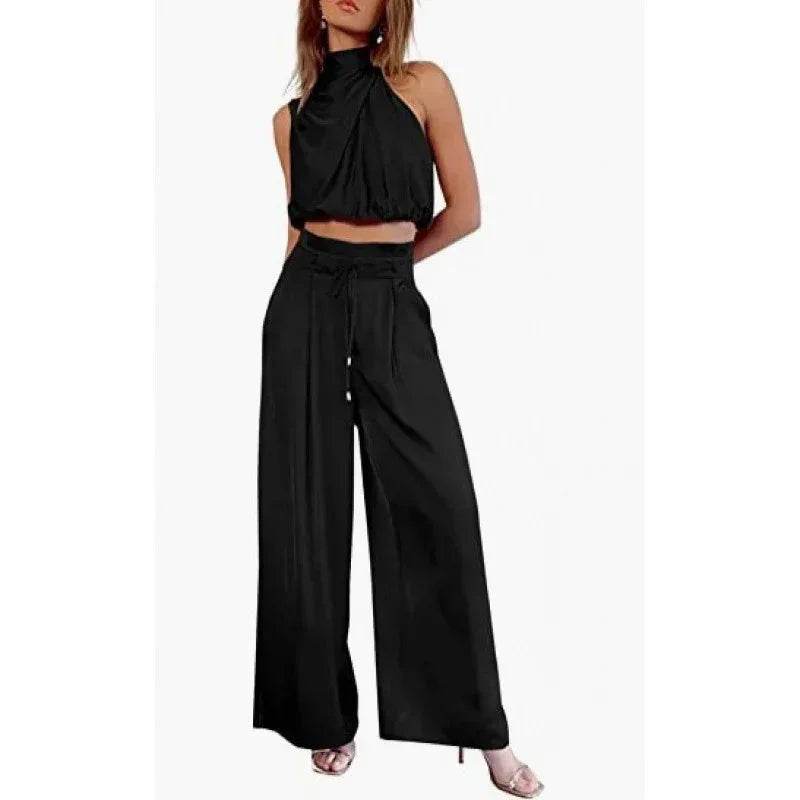 Woman wearing stylish black wide-leg pants and halter crop top set, trendy ZA-Zola fashion
