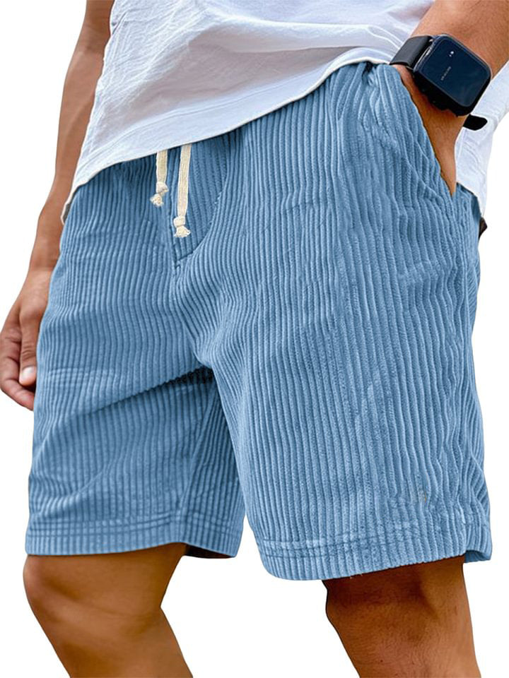 Blue striped shorts worn by a person on a white background