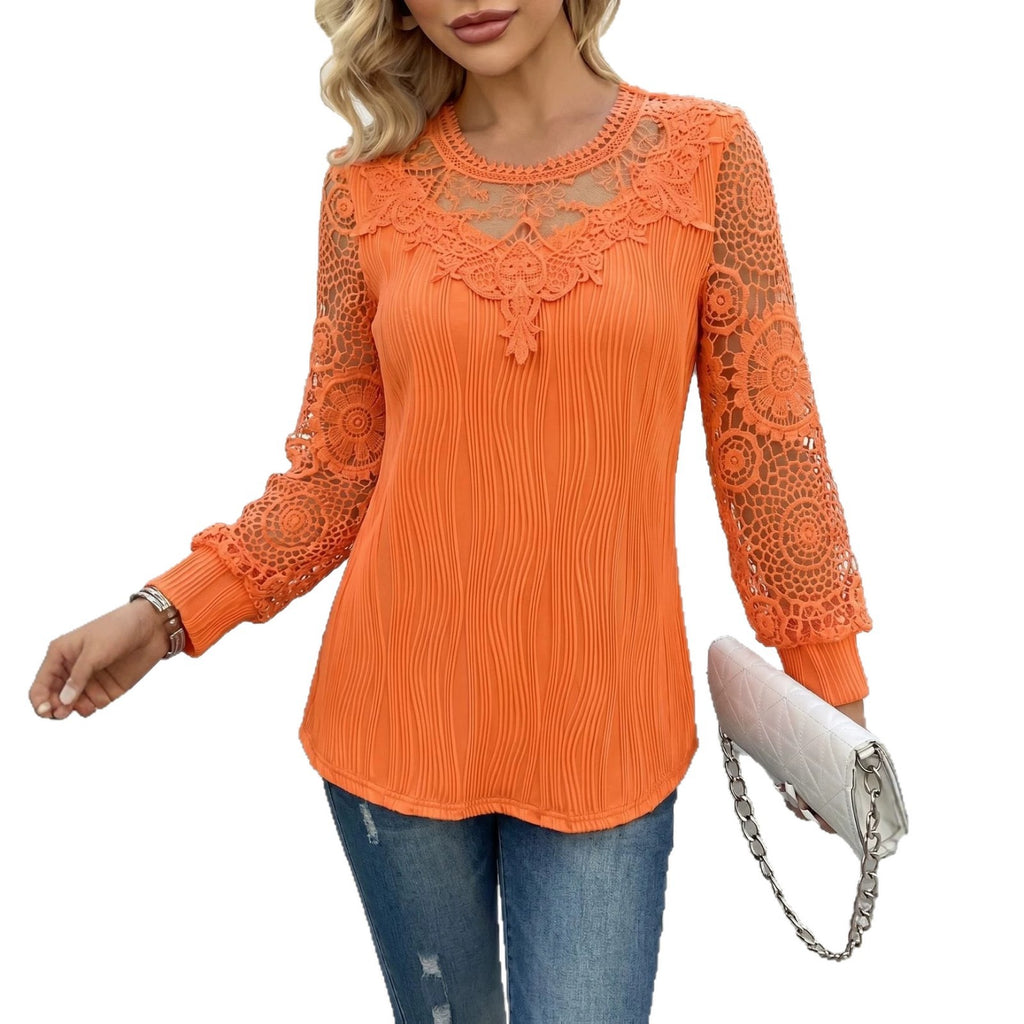 Orange lace long-sleeve top worn by a person on a white background