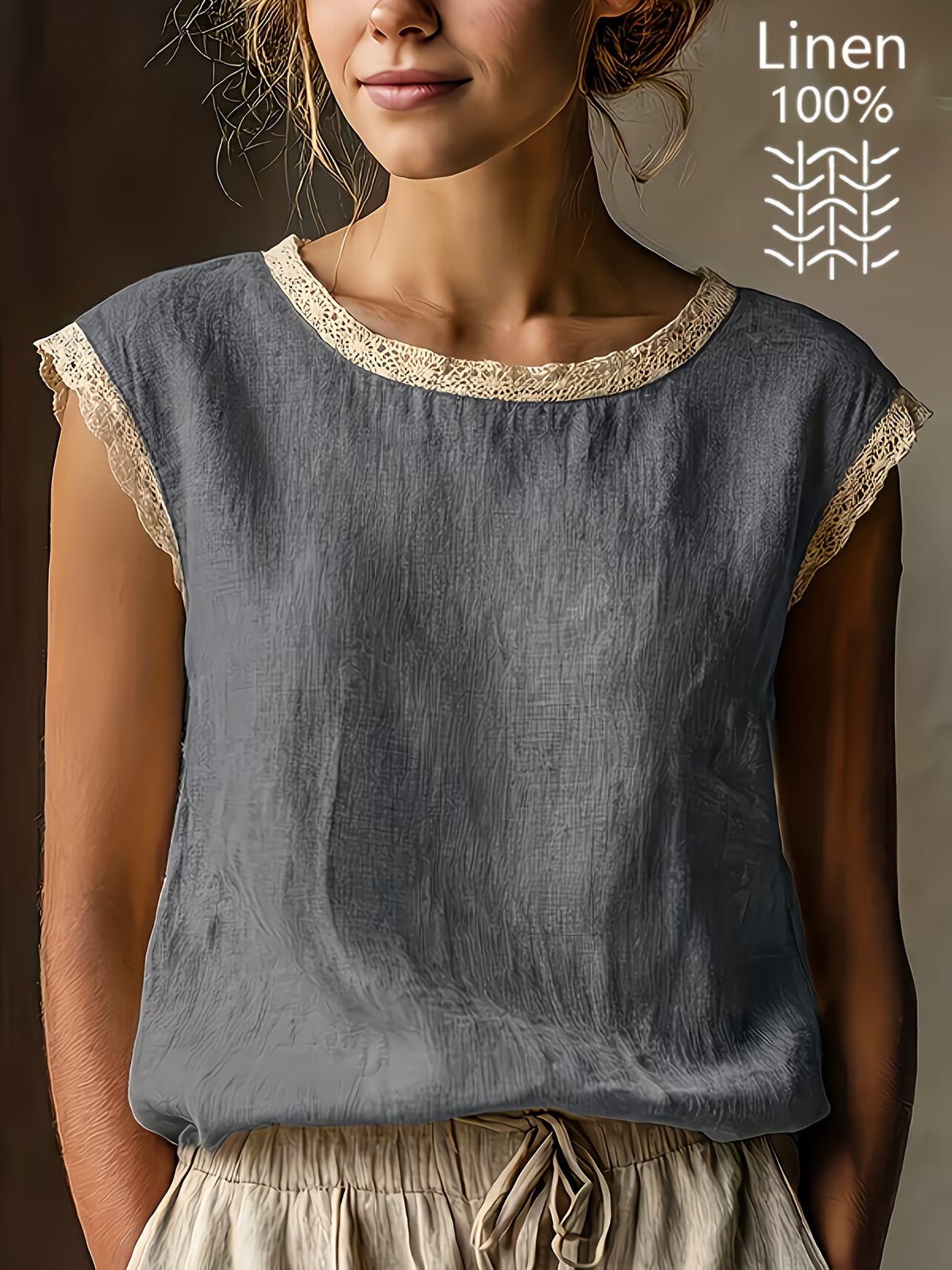 Woman wearing a sleeveless linen top with visible text indicating 100% linen.