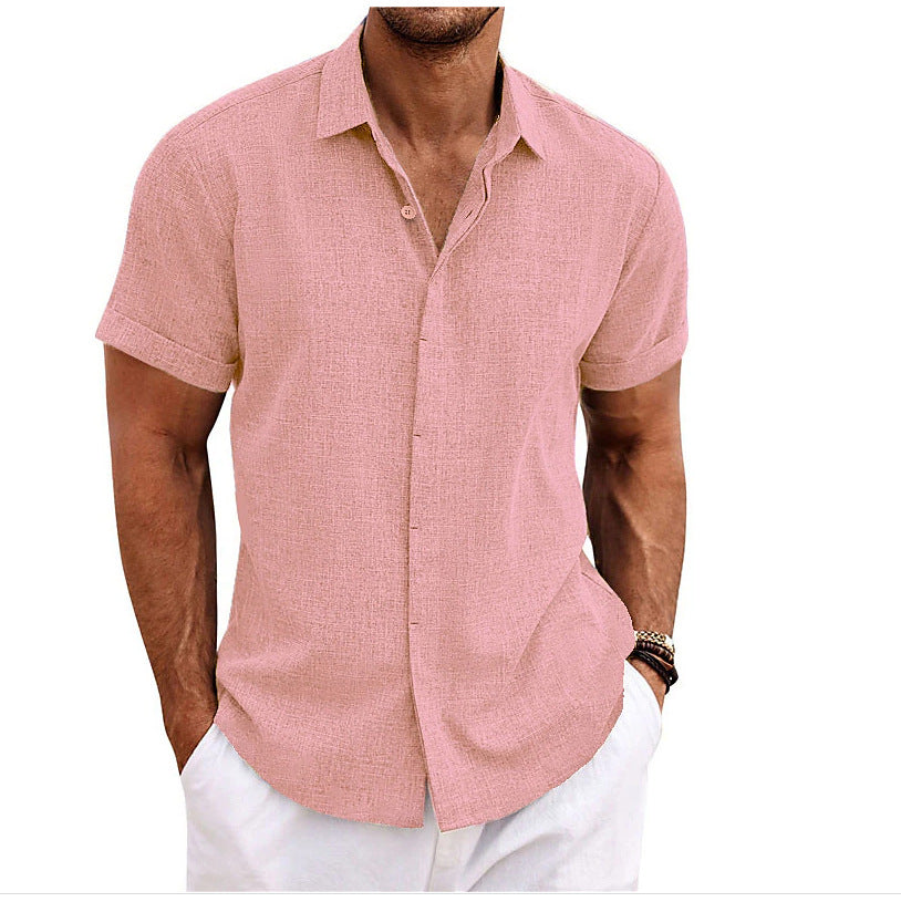 Man wearing a pink short-sleeve shirt on a white background
