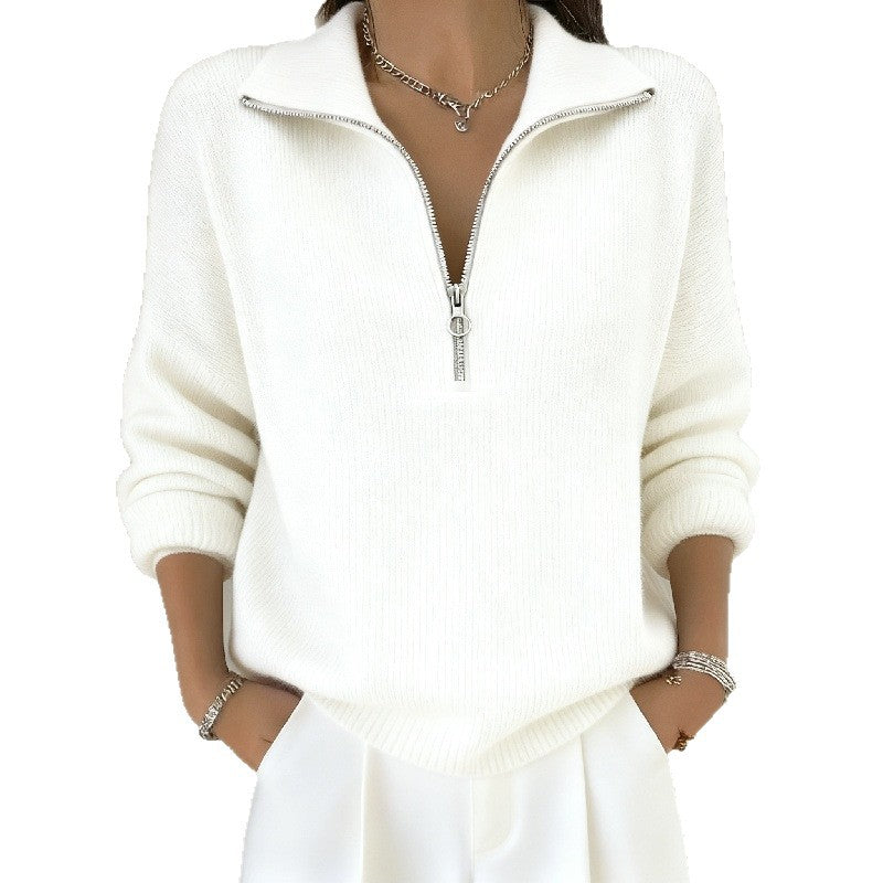 White zip-up sweatshirt worn by a person on a white background
