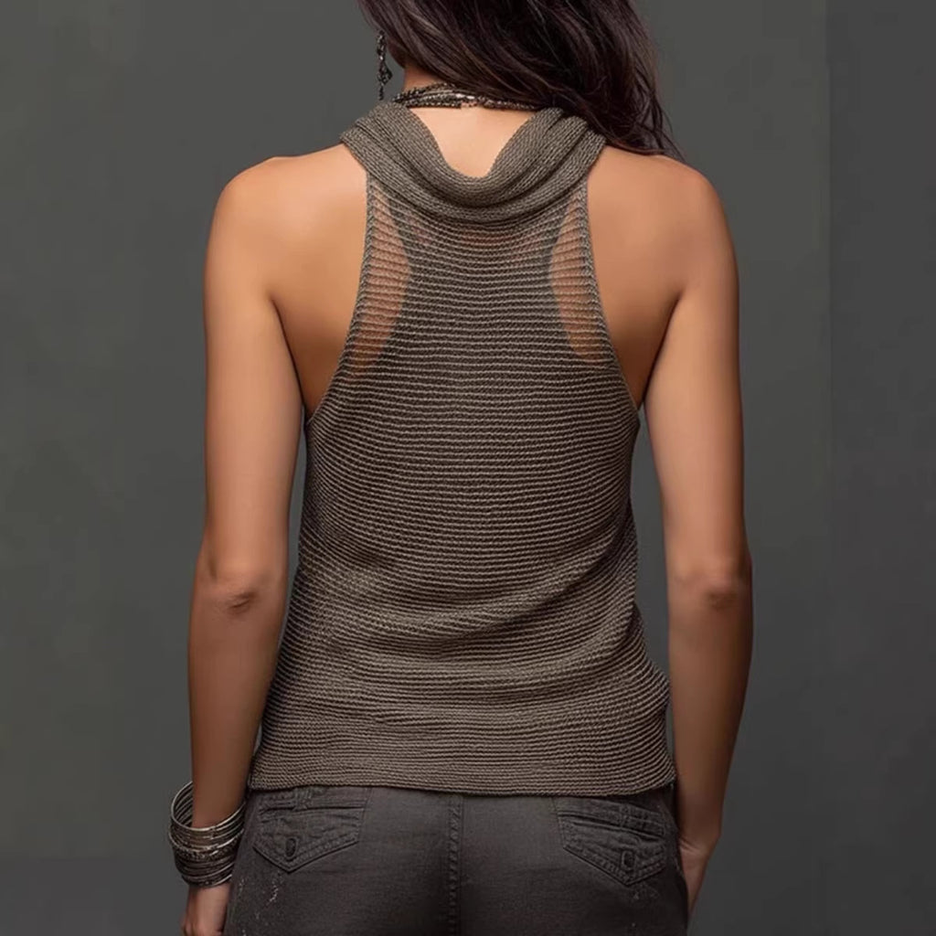 Person wearing a brown mesh tank top against a gray background