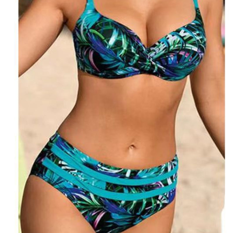 Woman wearing a tropical print bikini with a blurred background