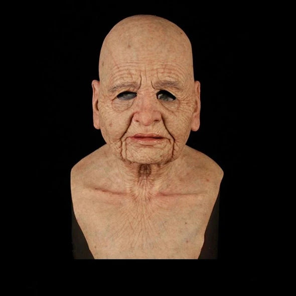 Bust of an elderly person with deep wrinkles on a black background