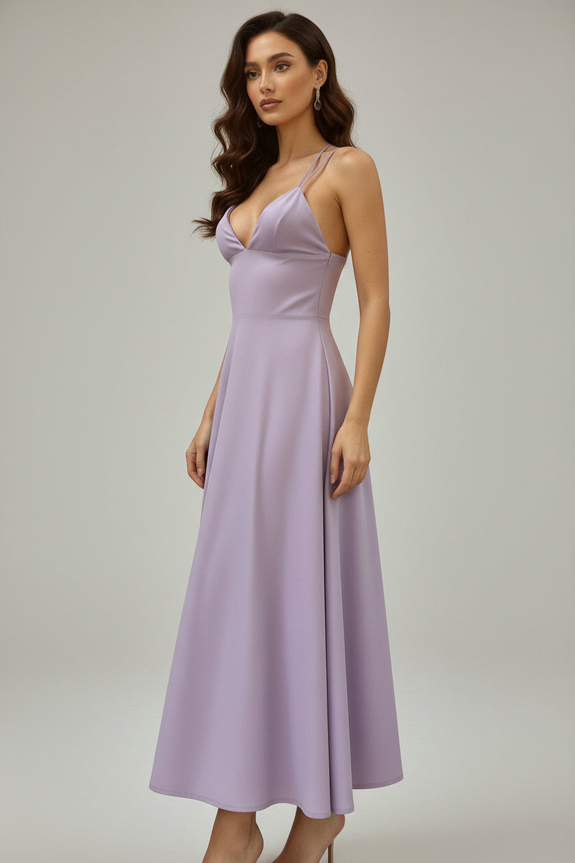 Lavender dress on a mannequin against a plain background