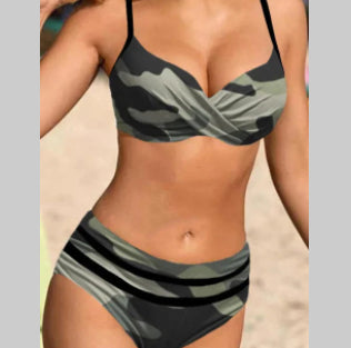 Person wearing a camouflage bikini set on a neutral background