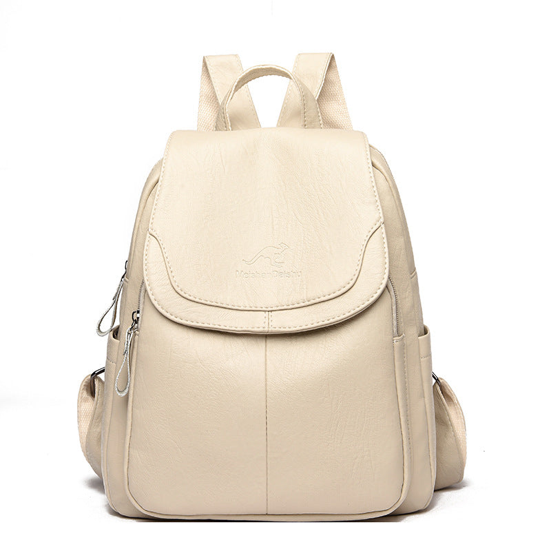 Beige backpack on a white background