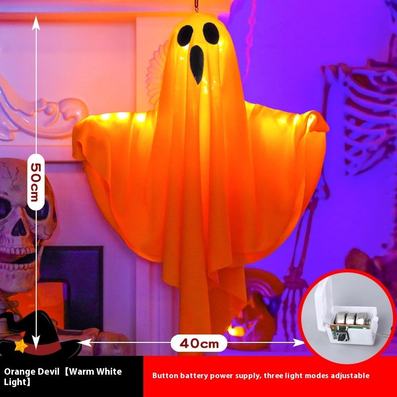 Halloween-themed decoration with a ghost figure and measurement details.