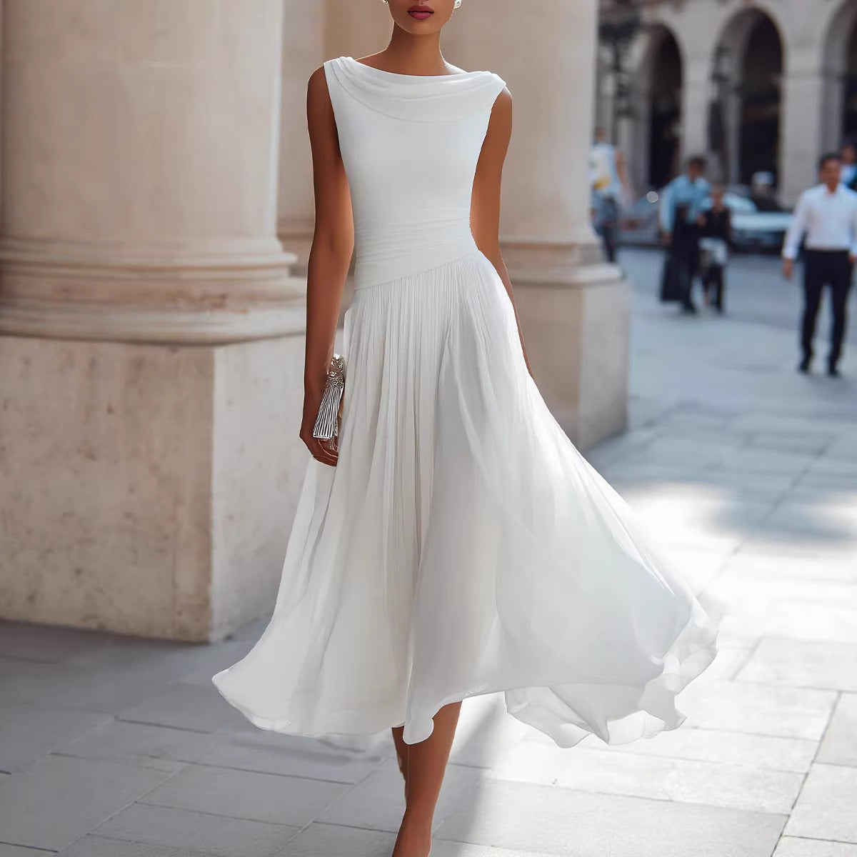 Woman in a white dress standing on a city street with classical architecture.