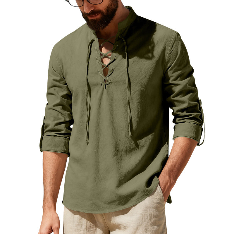 Man wearing a green long-sleeve shirt with a white background