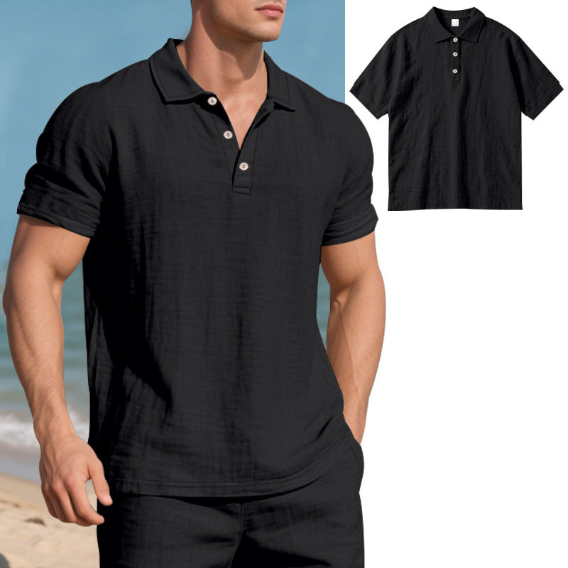 Man wearing a black polo shirt on a beach with an inset of the shirt.