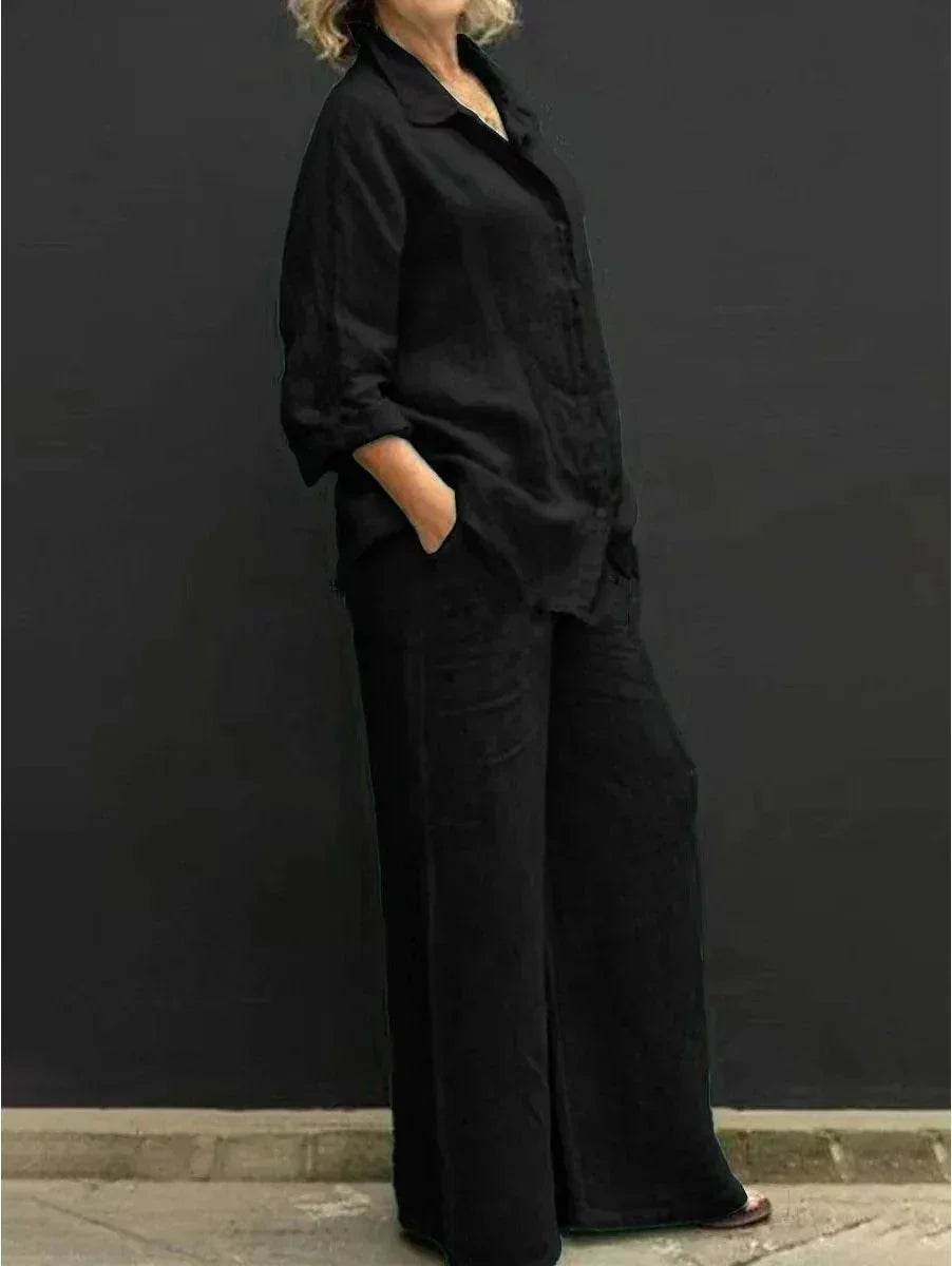 Woman in black linen shirt and wide-leg trousers, ZA-Zola trendy minimalist fashion style