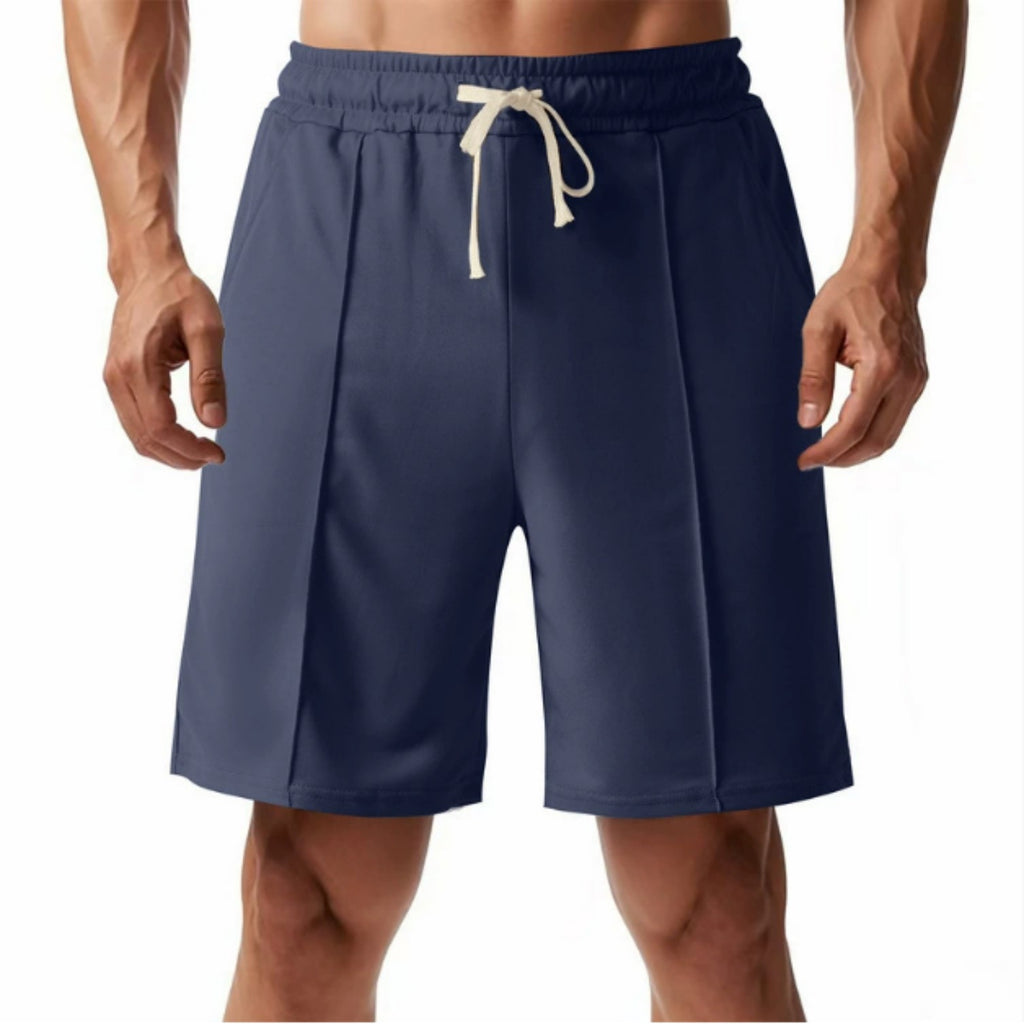 Navy blue shorts with a white drawstring on a white background