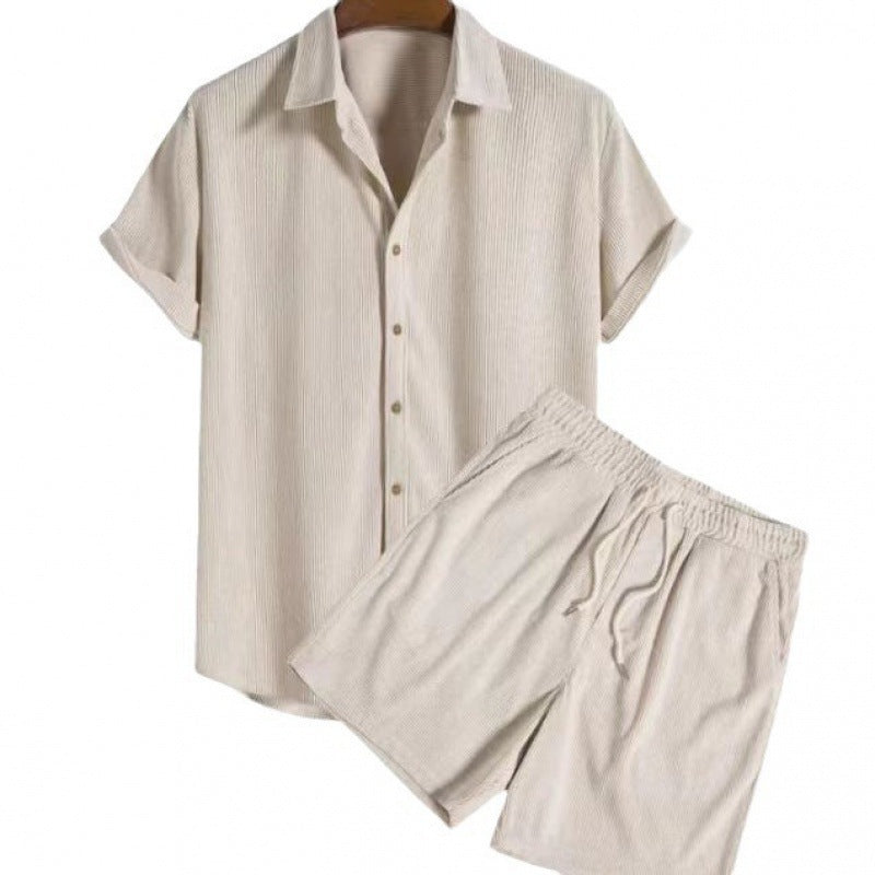 Beige short-sleeve shirt and shorts set on a white background