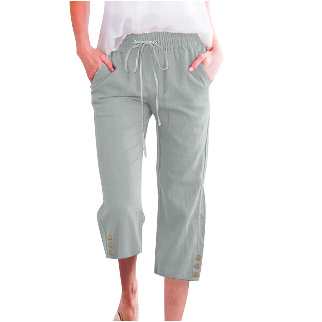 Light gray capri pants worn by a person on a white background