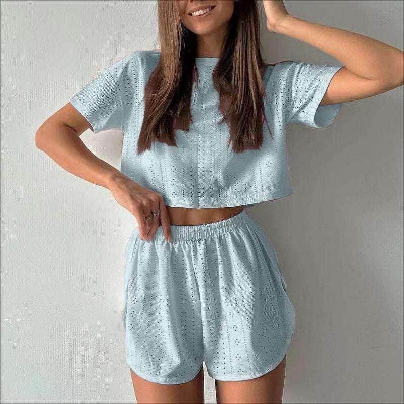 Woman wearing light blue eyelet crop top and shorts set, trendy ZA-Zola UK loungewear